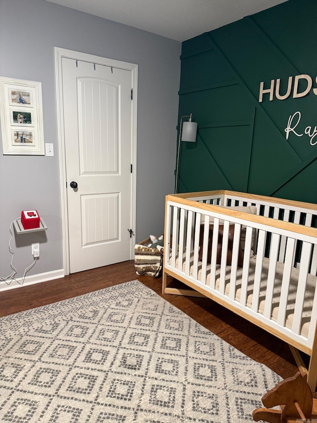 bedroom with wood-type flooring