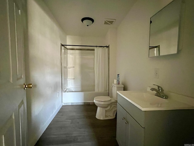 full bathroom with wood-type flooring, vanity, toilet, and shower / bath combo with shower curtain