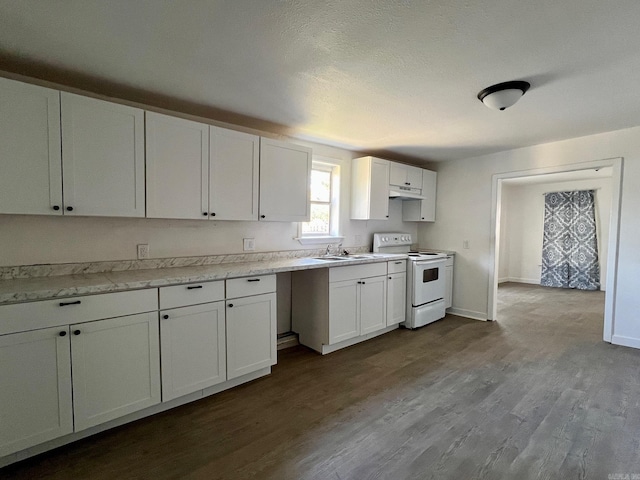 kitchen with white cabinetry, hardwood / wood-style floors, sink, and white electric range