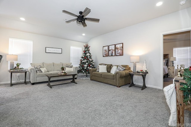 carpeted living room featuring ceiling fan