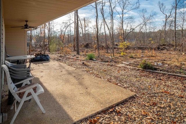 view of patio featuring ceiling fan