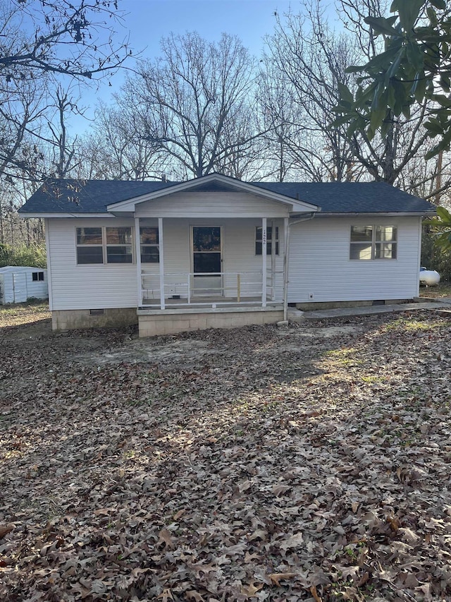 view of front of property featuring covered porch