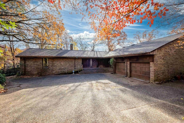 ranch-style home with a garage