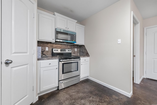 kitchen featuring white cabinetry, stainless steel appliances, and tasteful backsplash