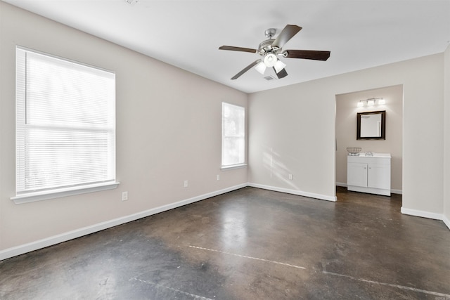 spare room featuring ceiling fan