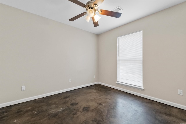 spare room with ceiling fan