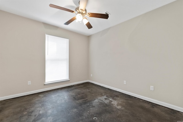 empty room featuring ceiling fan and a healthy amount of sunlight