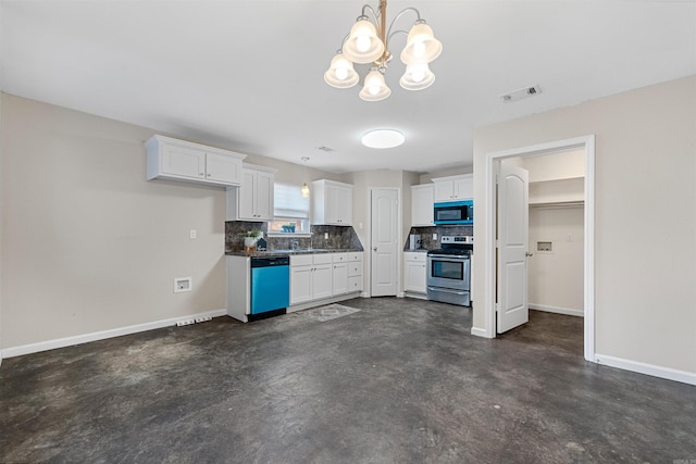 kitchen with a chandelier, appliances with stainless steel finishes, decorative backsplash, and white cabinetry