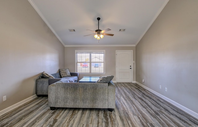 living room with wood-type flooring, ceiling fan, and crown molding