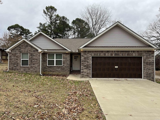 single story home featuring a garage