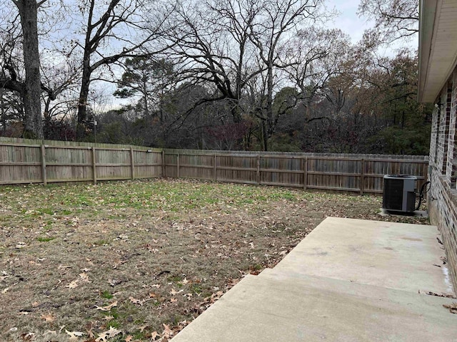 view of yard with a patio and central AC