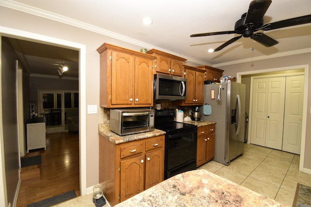 kitchen featuring tasteful backsplash, crown molding, appliances with stainless steel finishes, and light hardwood / wood-style flooring