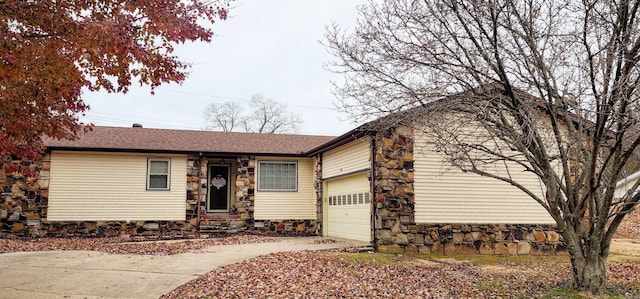 ranch-style home with a garage