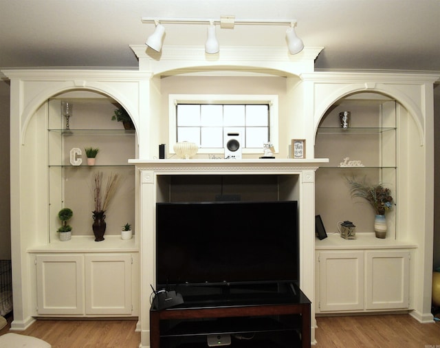 interior details featuring hardwood / wood-style flooring