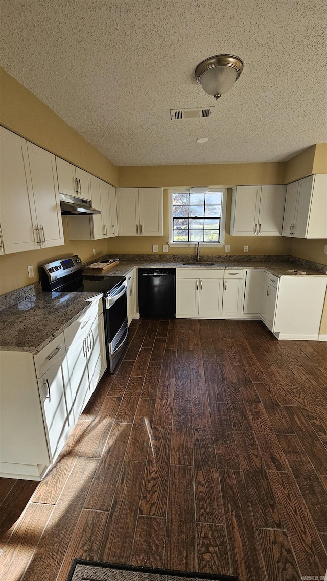 kitchen with dishwasher, dark hardwood / wood-style flooring, white cabinetry, and stainless steel electric range