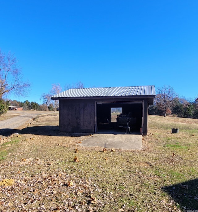 view of outbuilding with a garage