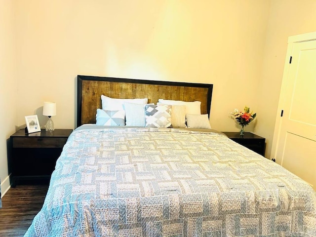 bedroom with wood-type flooring