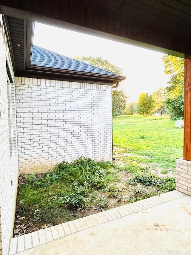 view of home's exterior featuring a lawn