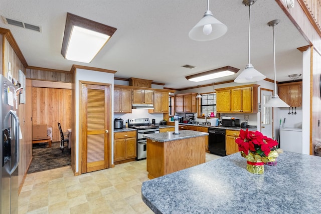 kitchen with a textured ceiling, crown molding, black appliances, a center island, and hanging light fixtures