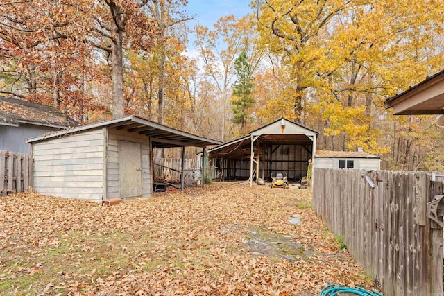 exterior space with a carport