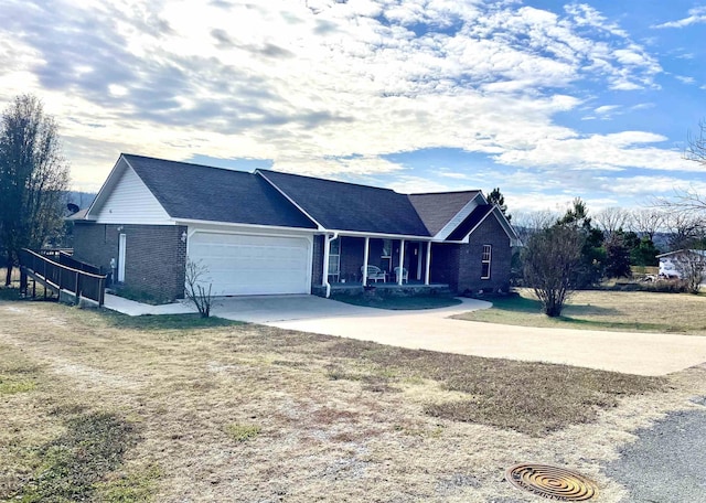 single story home with a garage and a front lawn