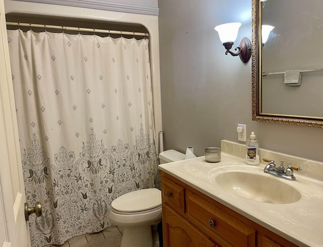 bathroom with tile patterned floors, vanity, toilet, and a shower with shower curtain