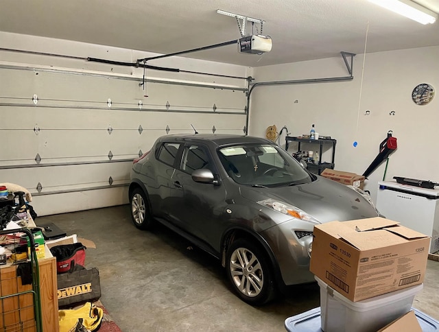 garage featuring a garage door opener