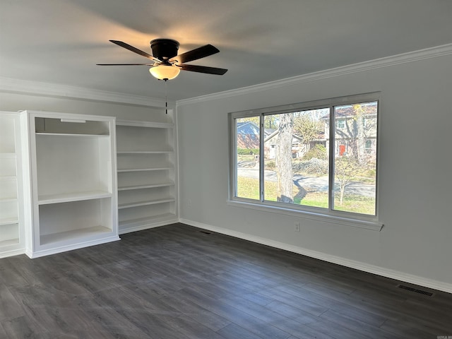 unfurnished bedroom featuring dark hardwood / wood-style floors, ceiling fan, and ornamental molding