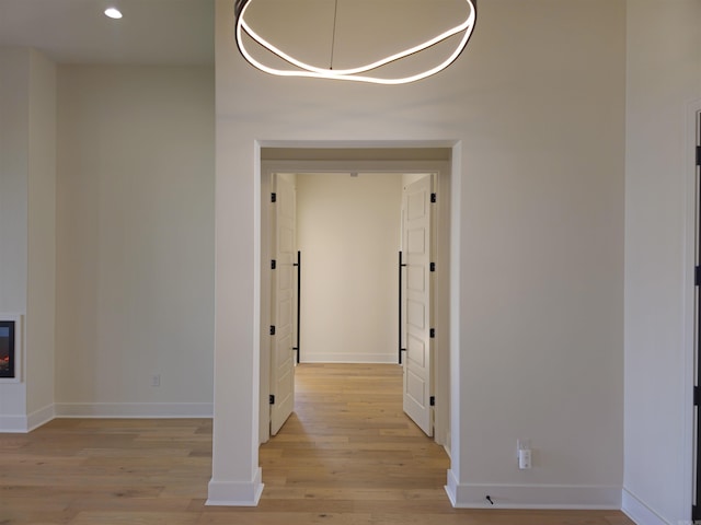 hall with light wood-type flooring