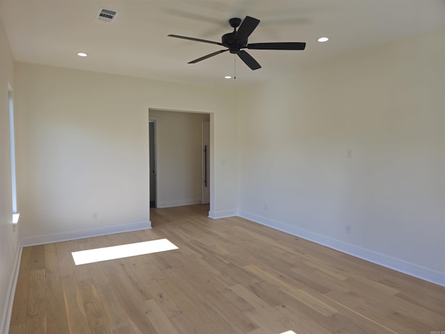 unfurnished room with light hardwood / wood-style flooring and ceiling fan