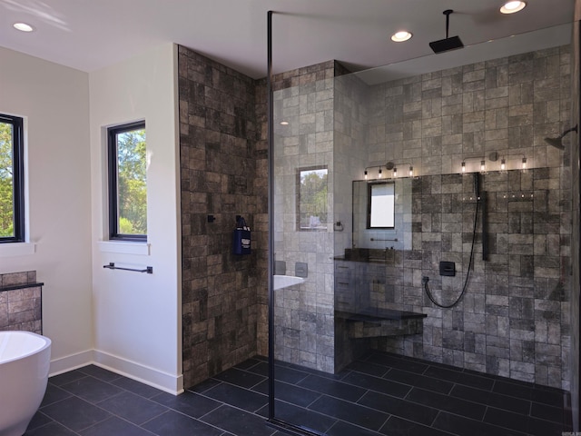 bathroom featuring separate shower and tub and tile patterned flooring