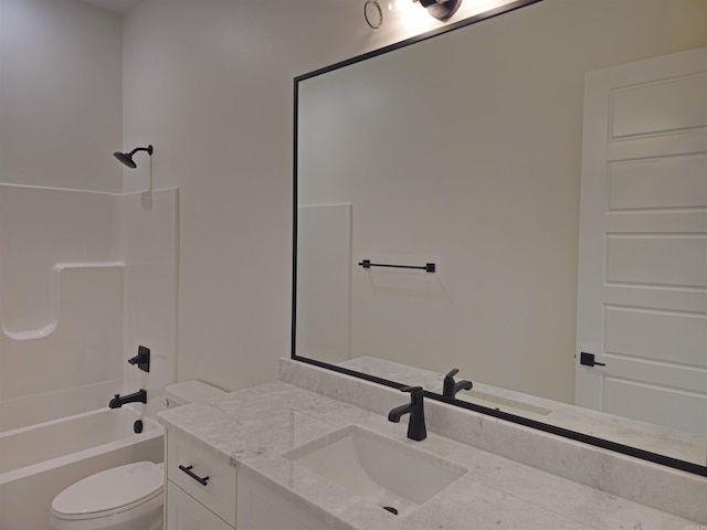 full bathroom with shower / washtub combination, vanity, and toilet