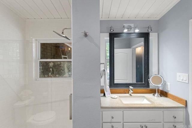 bathroom featuring toilet, vanity, wooden ceiling, and walk in shower