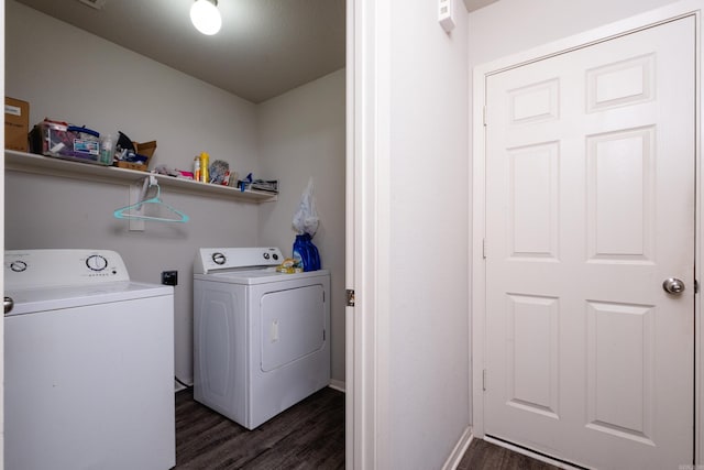 laundry room with dark hardwood / wood-style flooring and separate washer and dryer