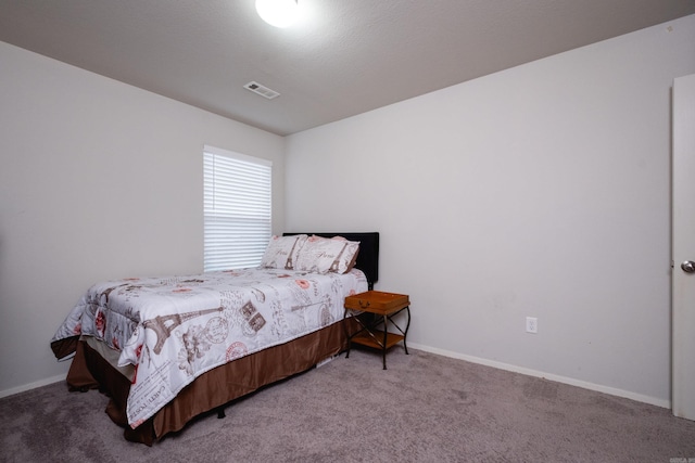 bedroom featuring carpet flooring