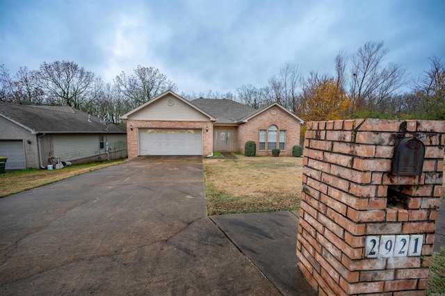 ranch-style home featuring a garage