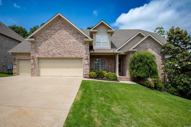 craftsman-style home featuring a front yard and a garage