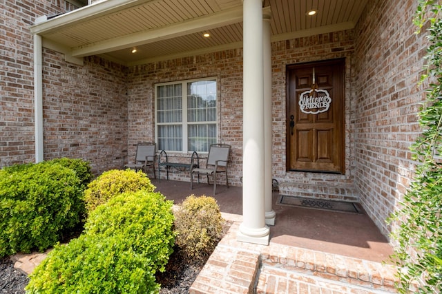 doorway to property with a porch