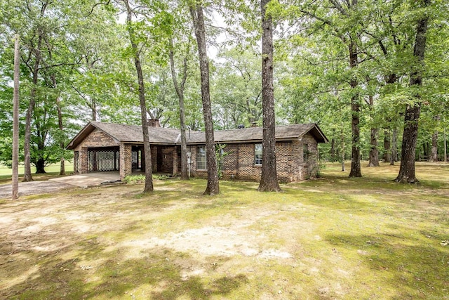 ranch-style house with a front yard