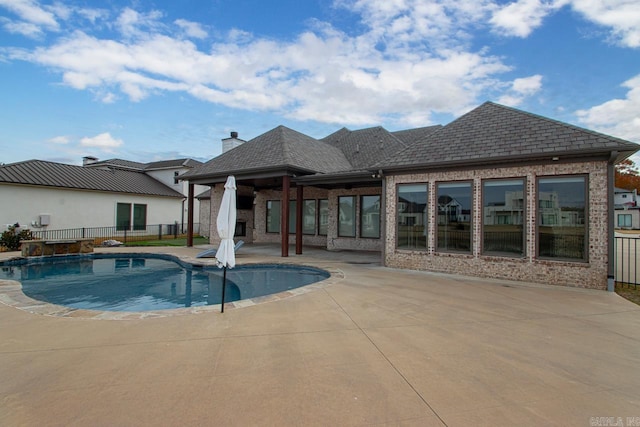 view of swimming pool featuring a patio