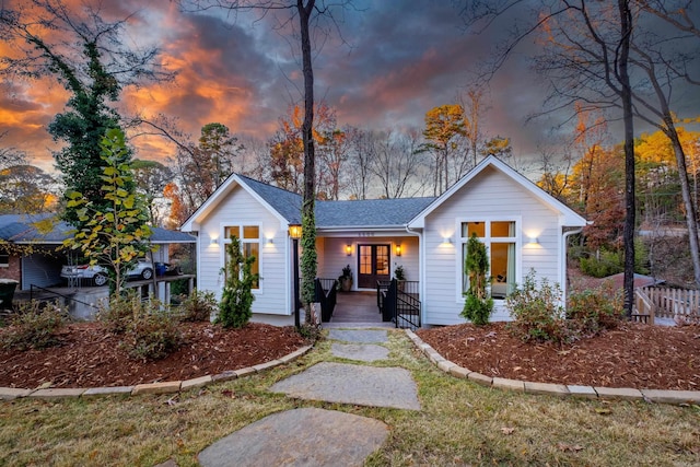 ranch-style home with covered porch