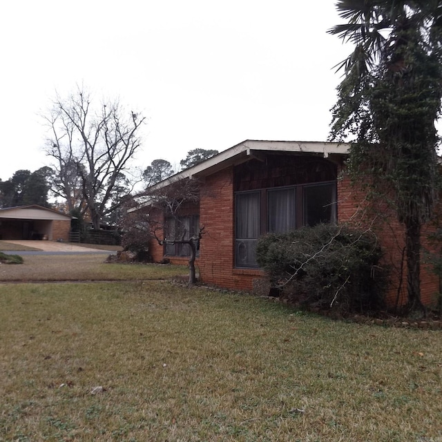 view of home's exterior featuring a yard