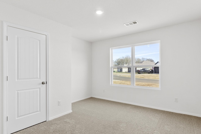 view of carpeted spare room