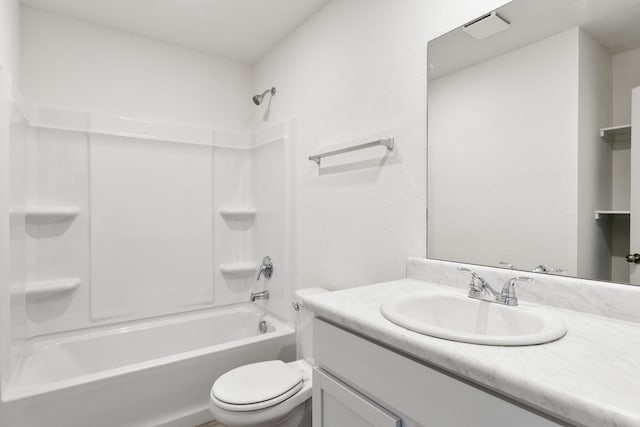 full bathroom with  shower combination, vanity, and toilet