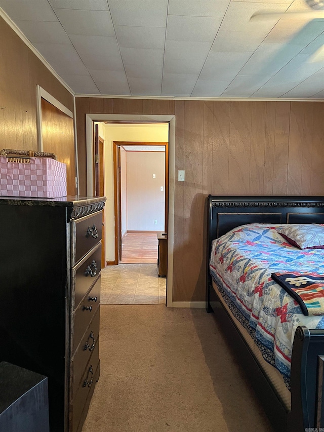 bedroom with wooden walls