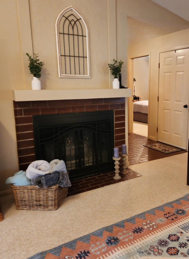 living room featuring carpet flooring, a fireplace, and vaulted ceiling