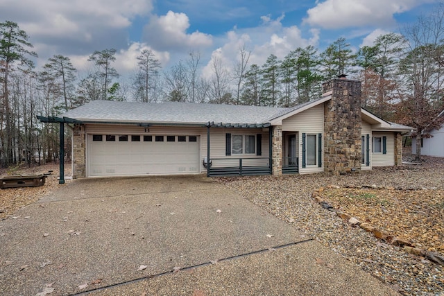 ranch-style house featuring a garage