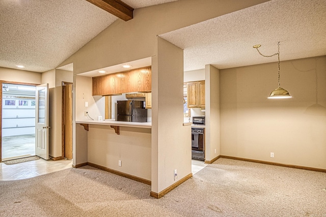 kitchen with a textured ceiling, light colored carpet, black appliances, pendant lighting, and vaulted ceiling with beams