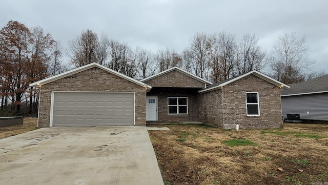 single story home with a garage