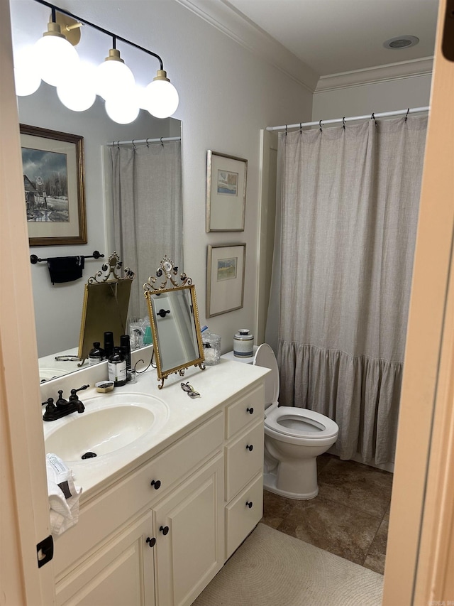 bathroom with a shower with curtain, vanity, toilet, and crown molding